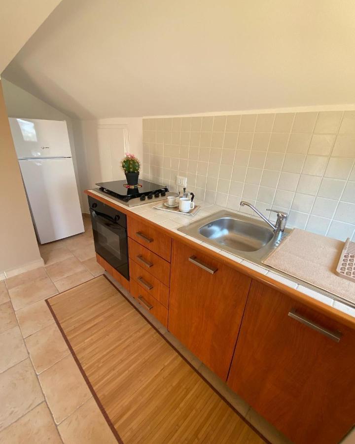 L'Oasi Dell'Eremita Apartment Мондело Екстериор снимка