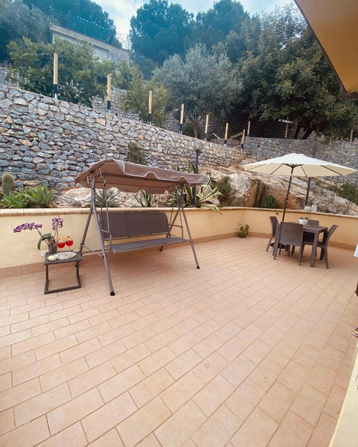 L'Oasi Dell'Eremita Apartment Мондело Екстериор снимка